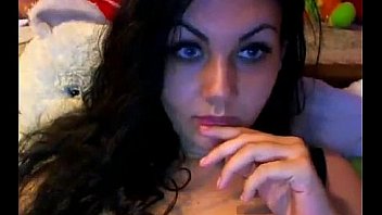 Amateur brunette reveals her tits