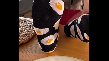My so delicious nylon soles next to your plate with fried eggs