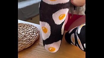 My so delicious nylon soles next to your plate with fried eggs