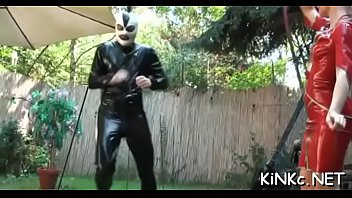 Female dom plays with ass bondman