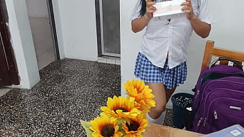 A fake student in a sexy short skirt masturbates at home with a dildo her tits look inflated