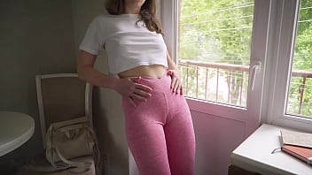 Sexy girl in leggings teases her big camel toe