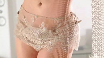 Aphrodisiacal blonde nikki benz strips off & poses in a slow way