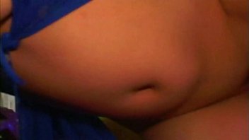 Curvy brunette asian rides a stud cowgirl style on the sofa