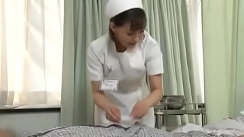 Sexy japanese nurse giving patient a handjob