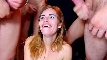 Blonde entertains herself with 4 guys giving them deep blowjobs