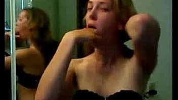 She fist her mouth and gags