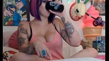 Girl with purple haired talking and showing tits