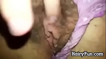 Hairy and wet pussy fingering close up
