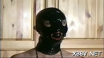 Pretty darling is shoving a big rubber sextoy