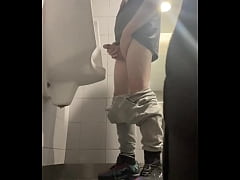 Play MP4 - 2 boys in sneakers having fun at public toilets' urinal