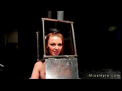 Play MP4 - BDSM babe with head in steel box spaked
